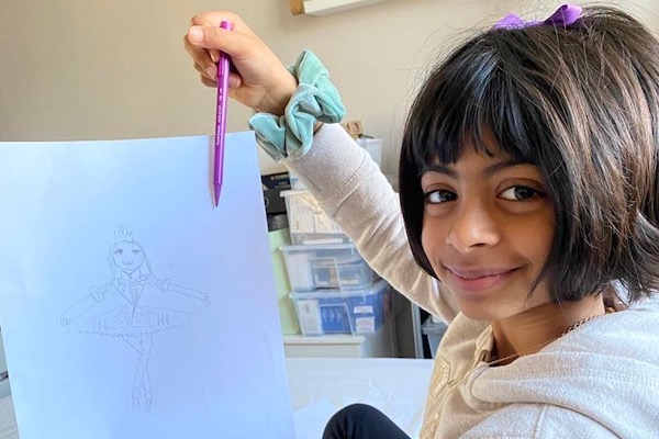 lazy Girl holding up a drawing